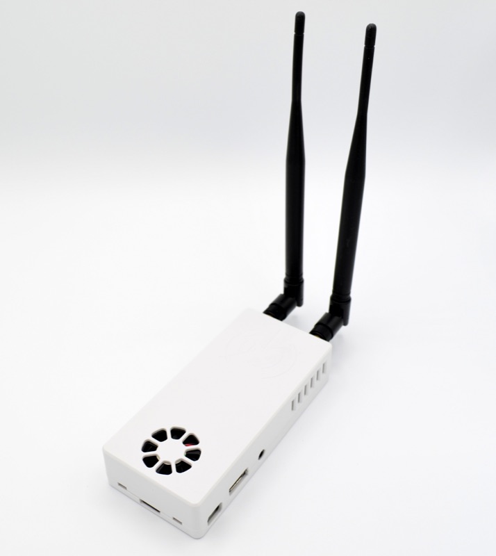Stratux dual-band ADS-B receiver in a white case with two antennas